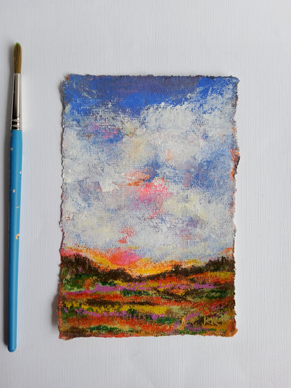 Abstract textured painting with a brush on a light gray background