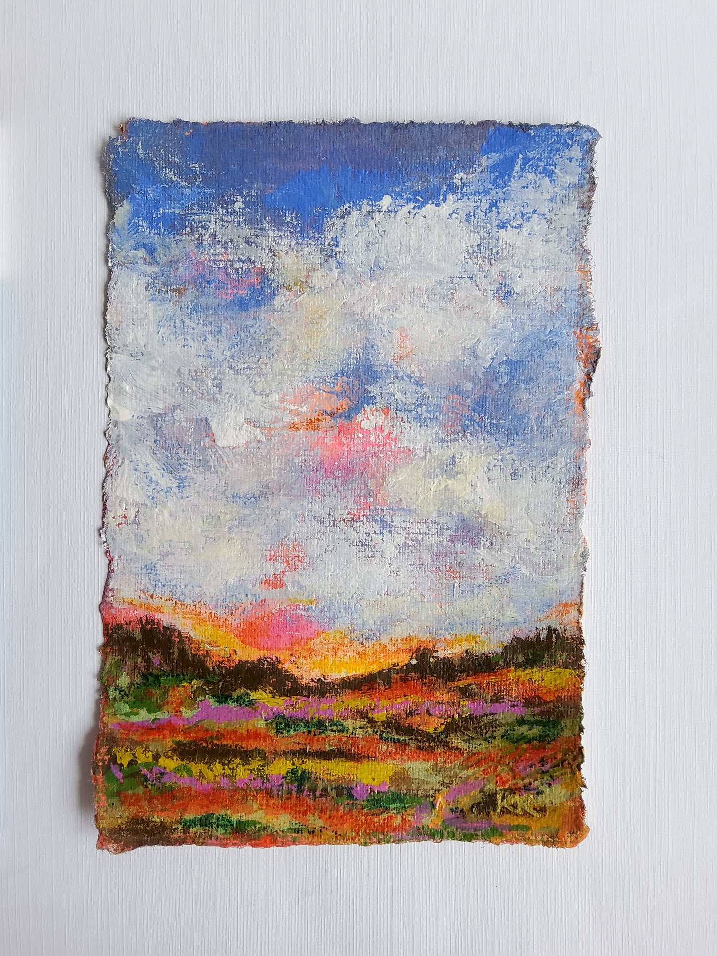 Original mini landscape painting with bright sky and colorful horizon on textured paper
