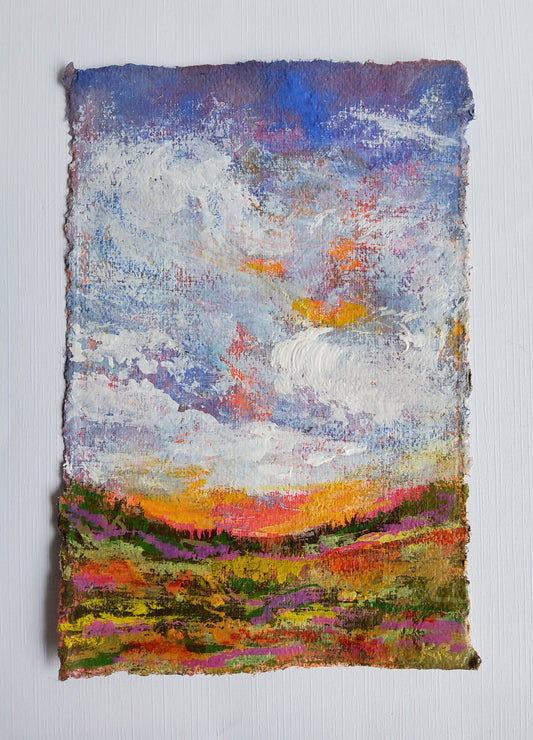 Original mini landscape painting with bright sky and colorful horizon on textured paper.