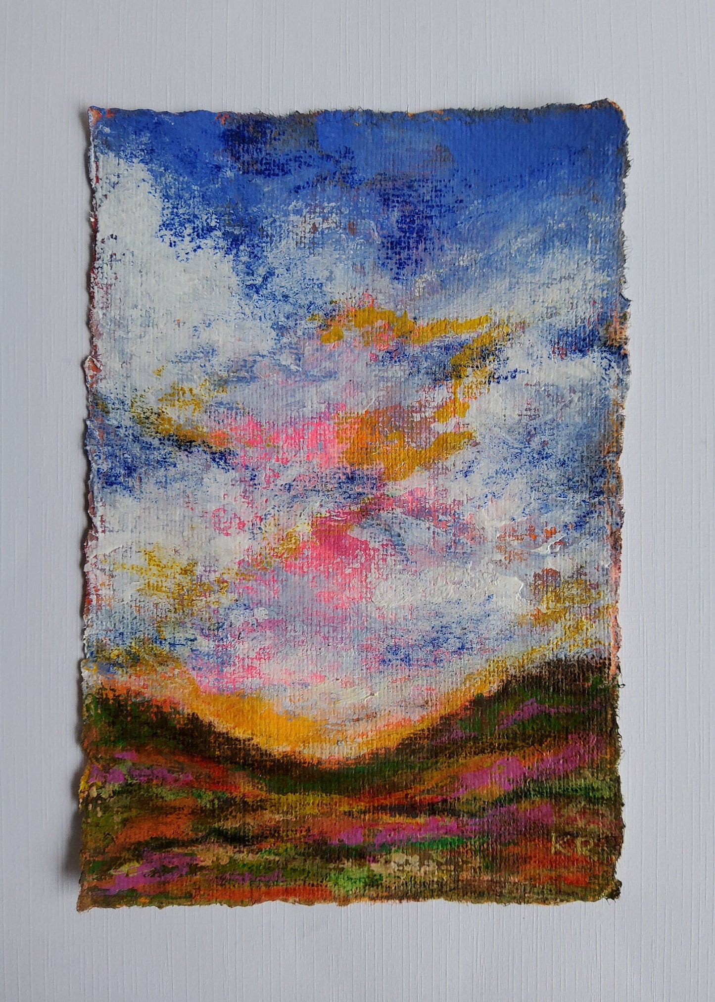 Vertical acrylic landscape with clouds, sunset tones, and deckle-edged handmade paper.