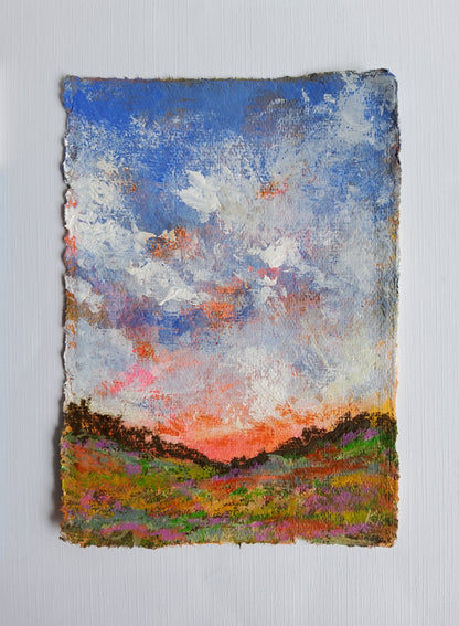 Abstract textured artwork with multicolors on a light gray background