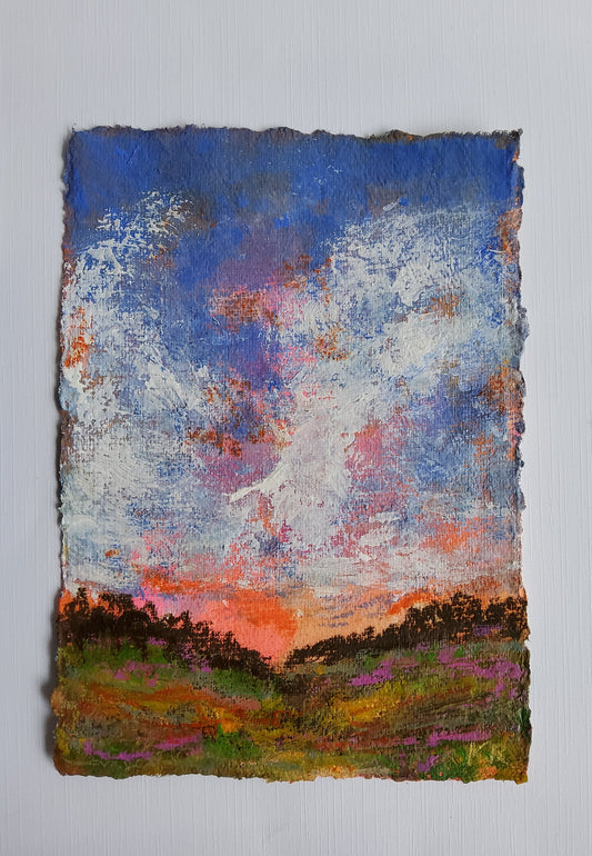 Original mini landscape painting with bright sky and colorful horizon on textured paper.