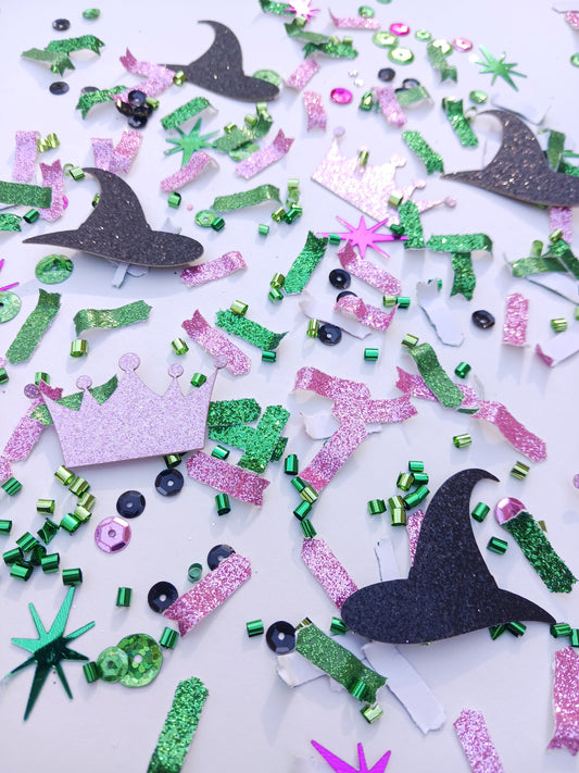 Colorful confetti with glittery shapes on a white background