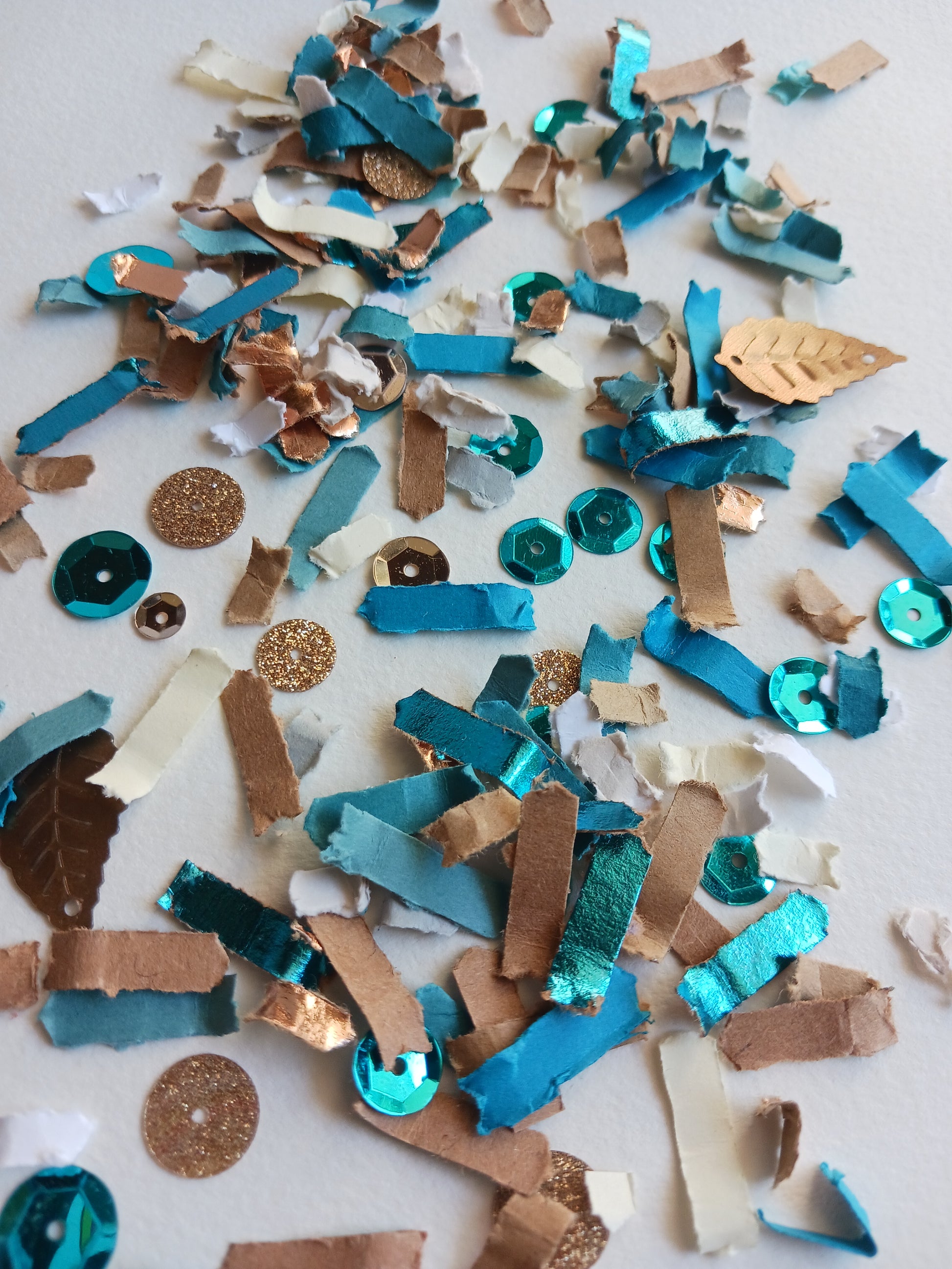 Colorful decorative confetti on a light background