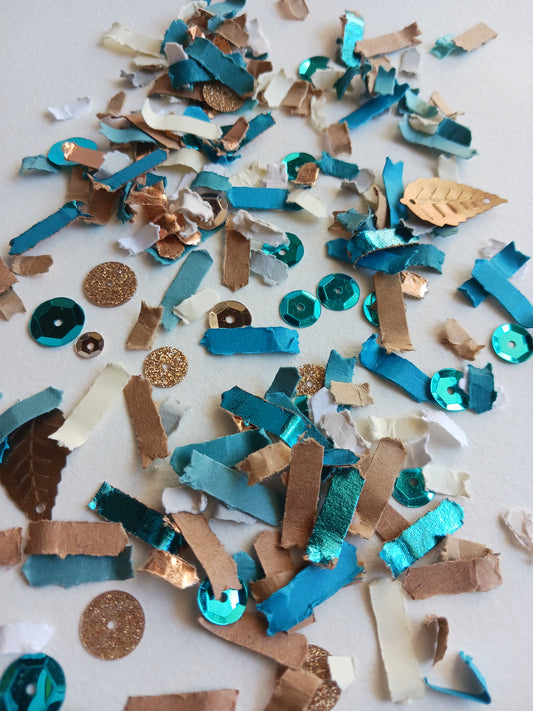 Colorful decorative confetti on a light background